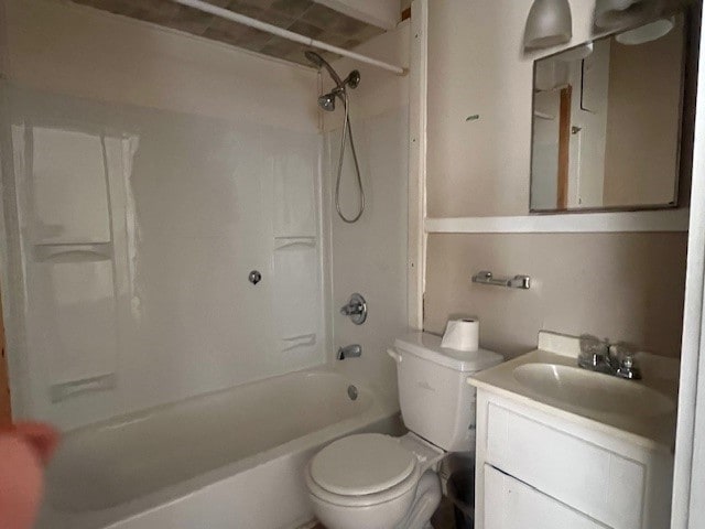 full bathroom with vanity,  shower combination, and toilet