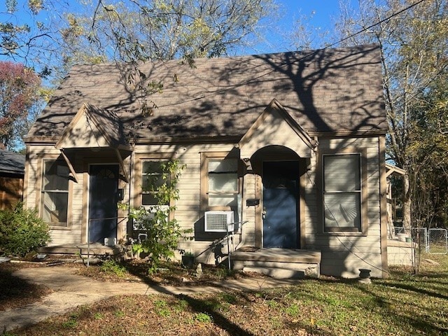 view of front of property with cooling unit