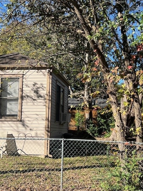 view of side of home with cooling unit