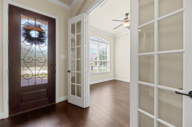 entrance foyer with dark hardwood / wood-style flooring, french doors, and ornamental molding