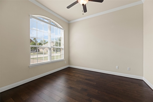 spare room featuring ceiling fan, crown molding, and dark wood-type flooring