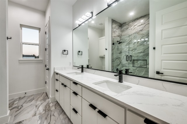 bathroom with vanity and an enclosed shower