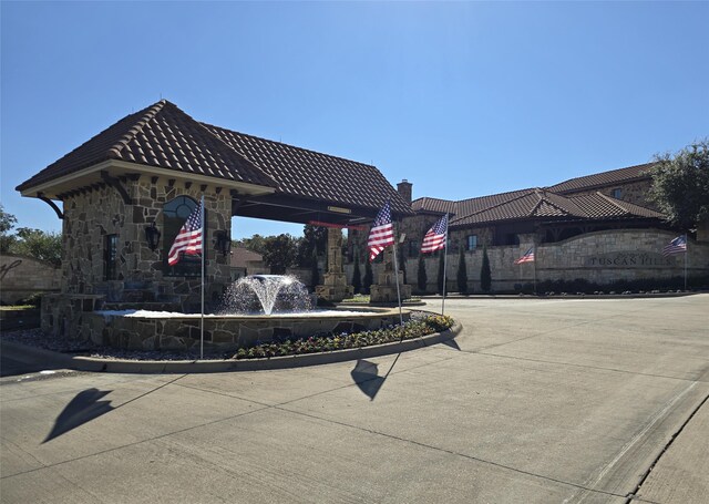 view of front of property with a front lawn and a garage