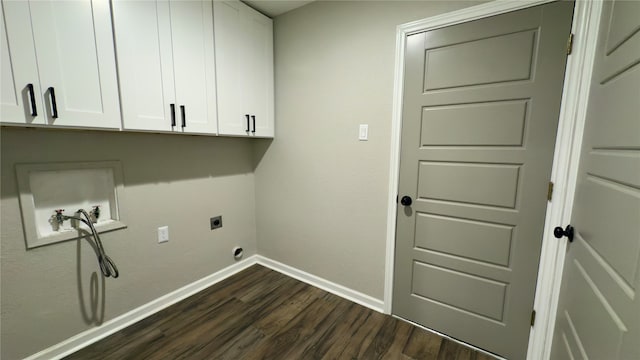 laundry room featuring hookup for an electric dryer, hookup for a washing machine, dark wood-type flooring, and cabinets