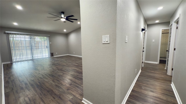 hall with dark hardwood / wood-style floors