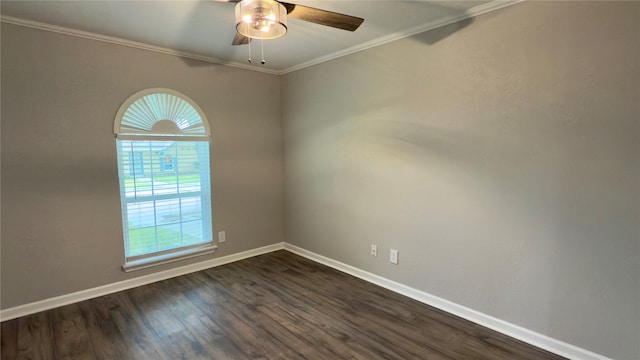 unfurnished room with ornamental molding, dark wood-type flooring, and ceiling fan