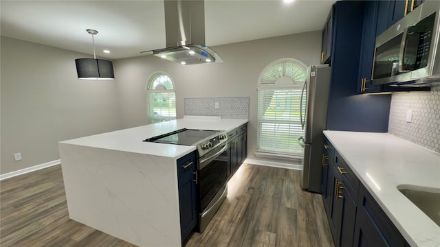 kitchen featuring island range hood, blue cabinetry, a healthy amount of sunlight, and stainless steel appliances