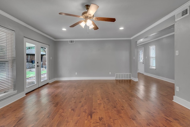 unfurnished room featuring ceiling fan, dark hardwood / wood-style floors, and crown molding