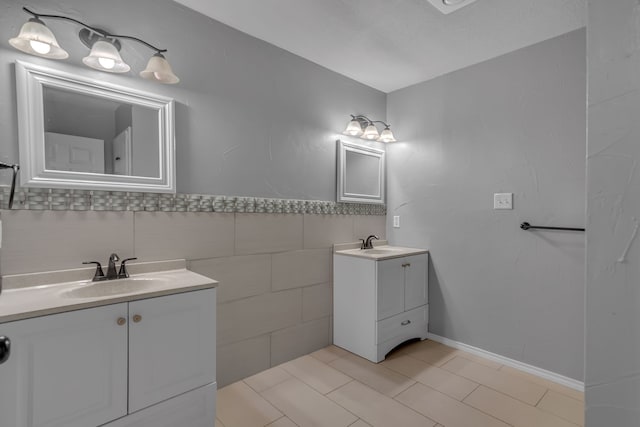 bathroom featuring vanity, tile walls, and tile patterned floors