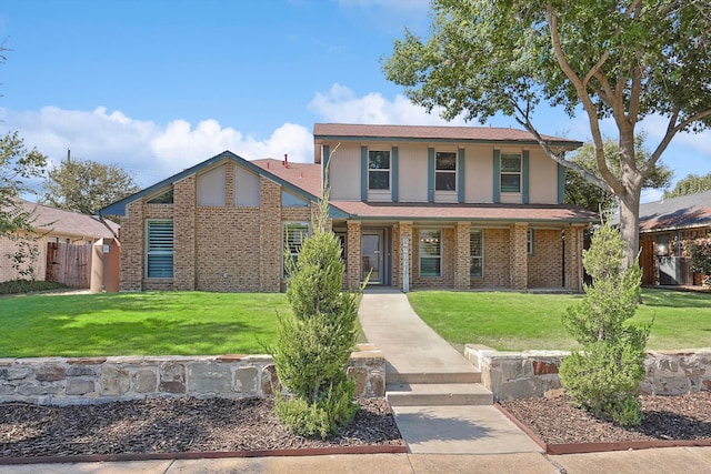 view of front of home with a front yard