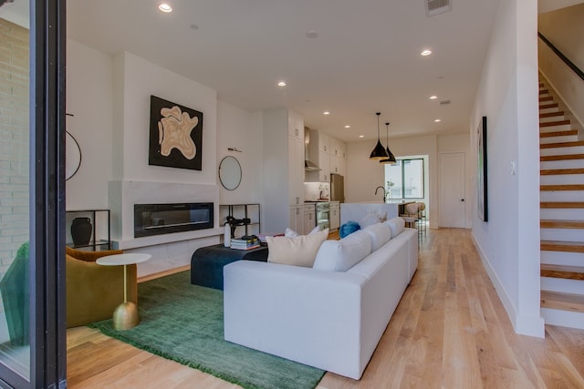 living room featuring light hardwood / wood-style floors