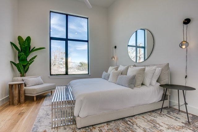 bedroom with hardwood / wood-style flooring