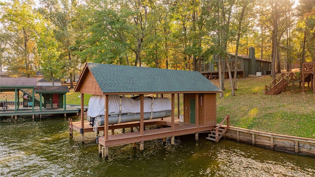 dock area featuring a water view