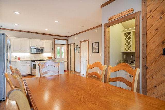 207 King Laurence Ct, Scroggins, TX 75480 - dining area with ornamental molding, recessed lighting, and light wood finished floors