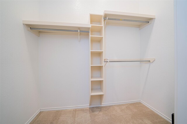 207 King Laurence Ct, Scroggins, TX 75480 - spacious closet with carpet flooring