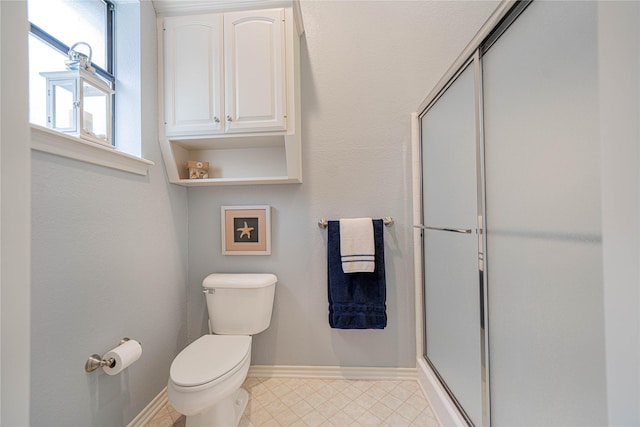 207 King Laurence Ct, Scroggins, TX 75480 - bathroom with baseboards, toilet, and a shower stall