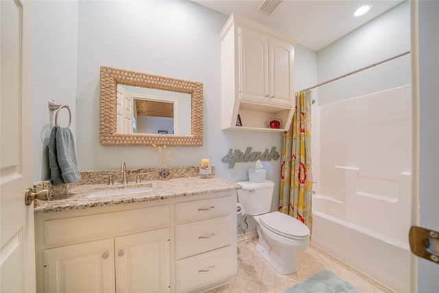 full bathroom with shower / bath combo with shower curtain, vanity, and toilet