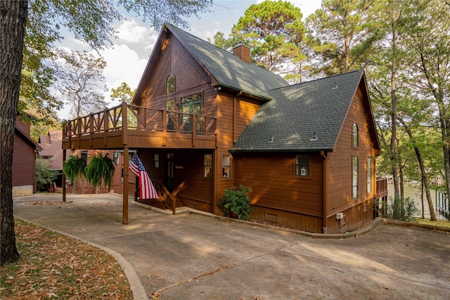 back of property with a deck