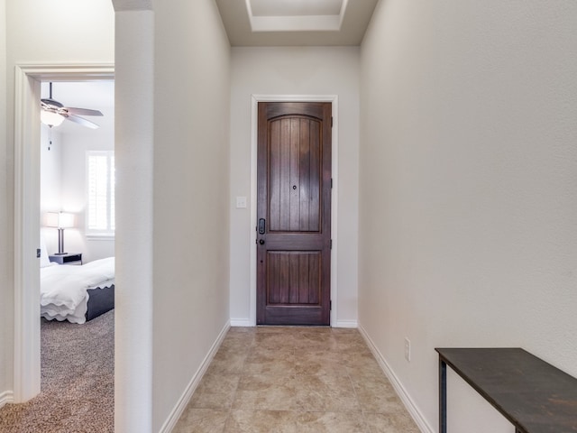 entryway with ceiling fan