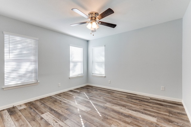 unfurnished room featuring wood-type flooring and ceiling fan