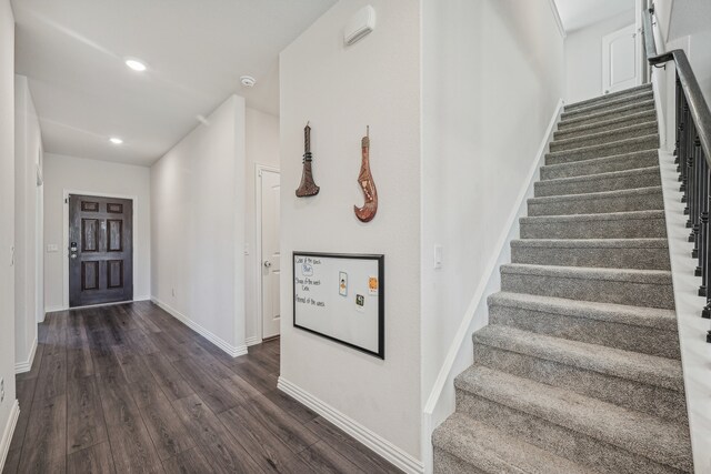 foyer entrance featuring dark hardwood / wood-style flooring