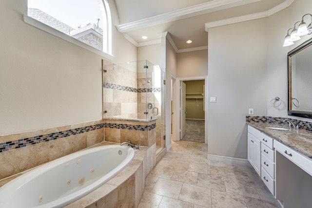 bathroom with vanity, crown molding, and plus walk in shower