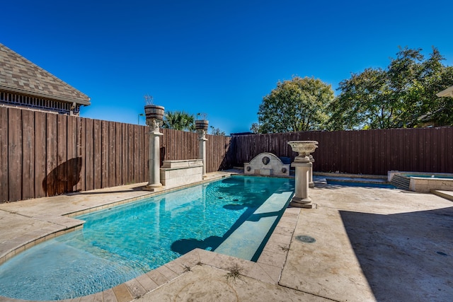 view of swimming pool featuring a patio