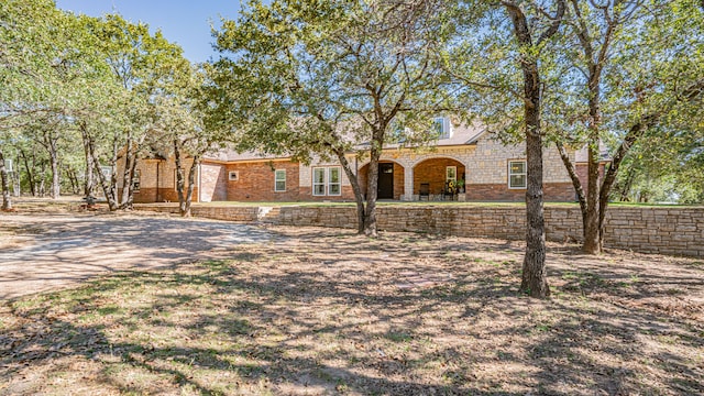 view of front of home featuring a patio area