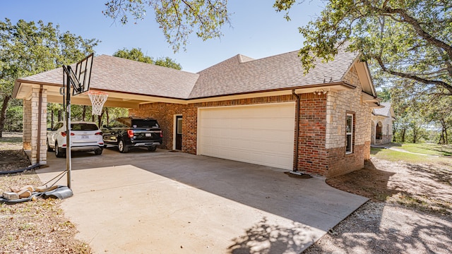 view of side of property featuring a garage