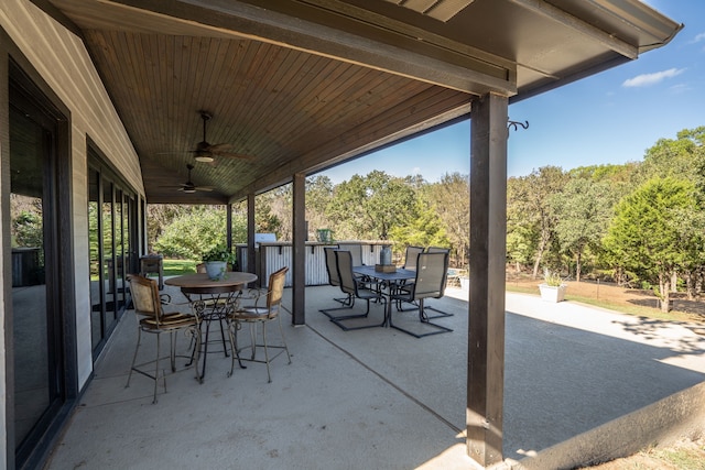 view of patio featuring ceiling fan