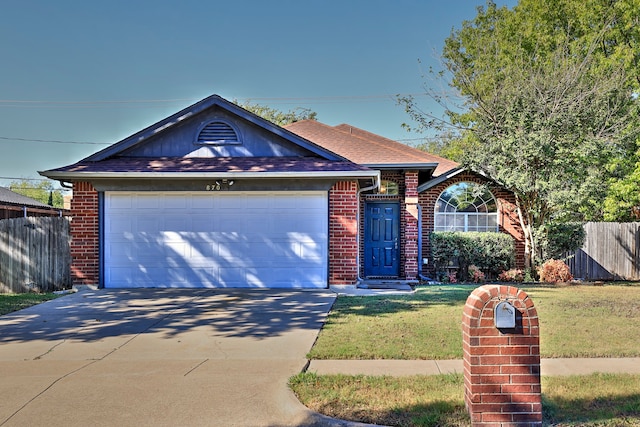 single story home featuring a front lawn and a garage