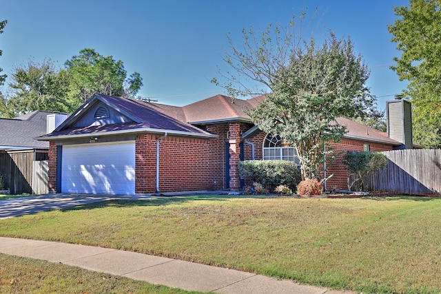 ranch-style home with a garage and a front yard