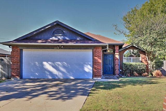 ranch-style home with a garage and a front lawn