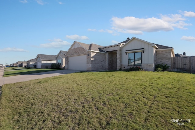 ranch-style house with a garage and a front yard