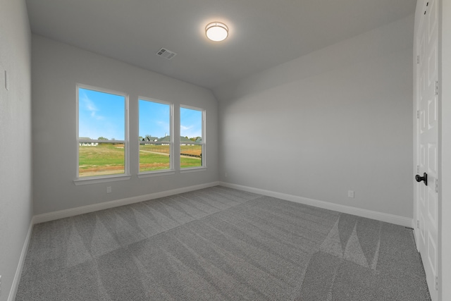 empty room featuring carpet floors