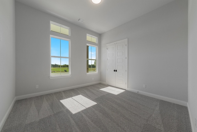 view of carpeted spare room