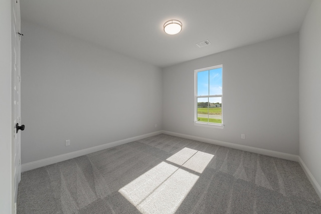 unfurnished room with carpet floors