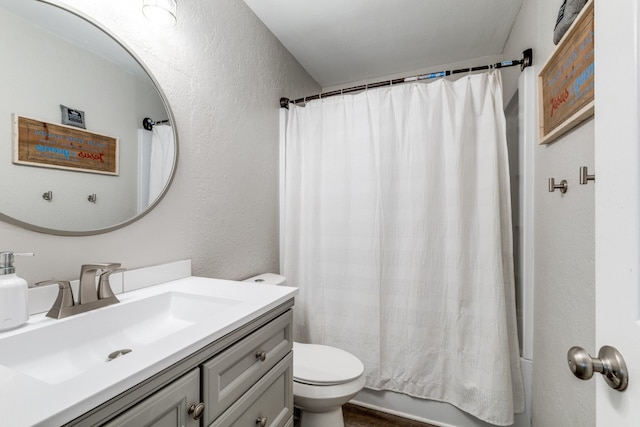 full bathroom featuring vanity, toilet, and shower / bathtub combination with curtain