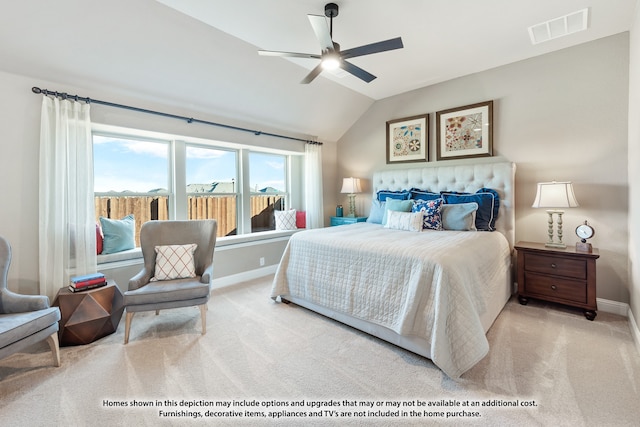 carpeted bedroom featuring ceiling fan and lofted ceiling