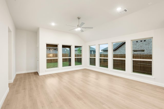 unfurnished sunroom featuring visible vents