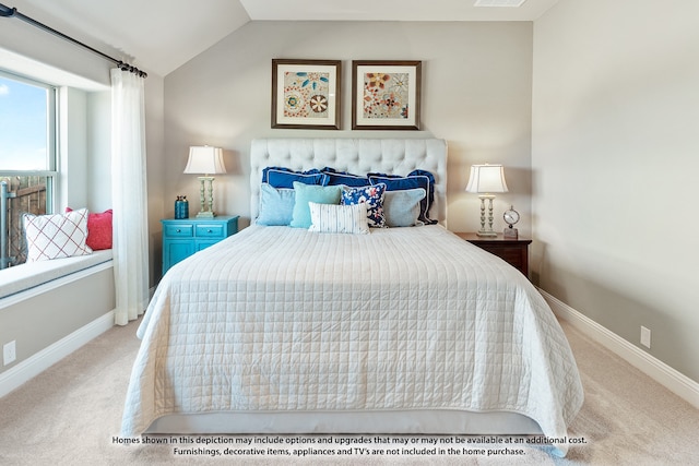 bedroom featuring light carpet and vaulted ceiling