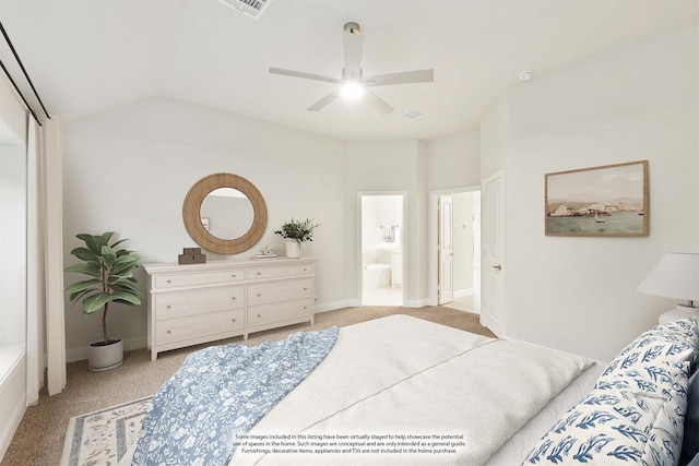 bedroom with visible vents, light colored carpet, baseboards, and ensuite bathroom