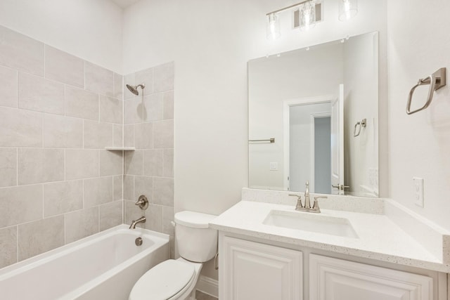full bath with washtub / shower combination, toilet, and vanity