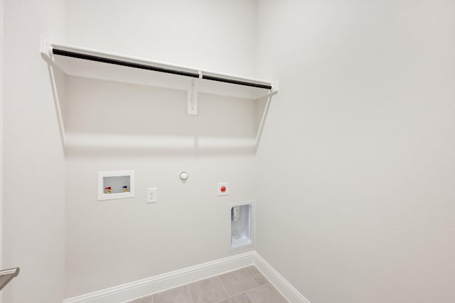 washroom featuring laundry area, washer hookup, hookup for an electric dryer, gas dryer hookup, and baseboards