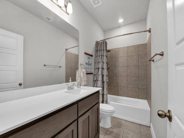 full bathroom featuring toilet, vanity, tile patterned flooring, and shower / bathtub combination with curtain