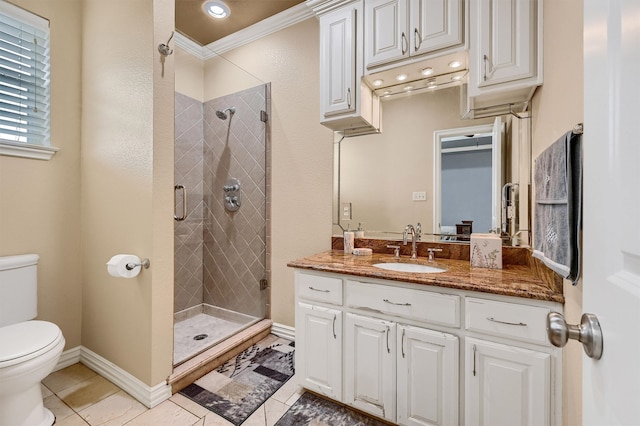 bathroom featuring tile patterned floors, toilet, ornamental molding, an enclosed shower, and vanity