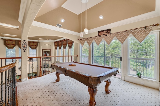 game room featuring pool table, ornamental molding, and plenty of natural light