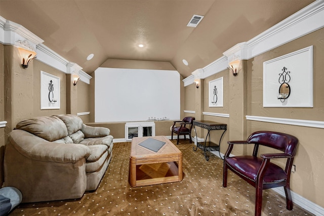 home theater with carpet flooring, lofted ceiling, and crown molding