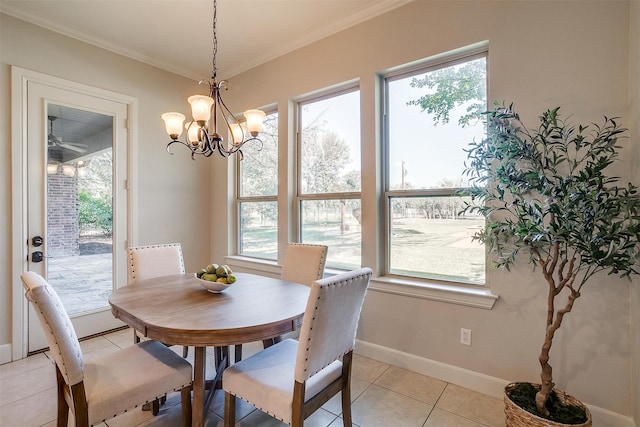 tiled dining area featuring a wealth of natural light, a notable chandelier, and crown molding