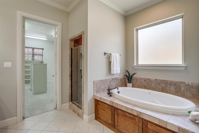 bathroom with ornamental molding, tile patterned flooring, and separate shower and tub